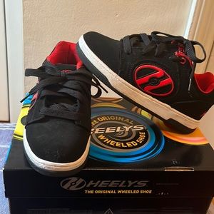 Boys size 3 Heelys. Hardware included. Good condition